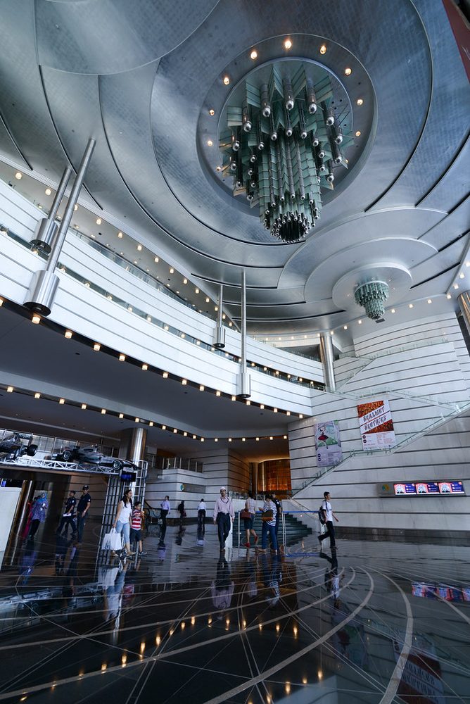Interior of the Petronas Towers grand foyer with marble and ornate details
