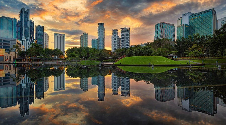 KLCC Park with lush greenery and the Petronas Towers behind