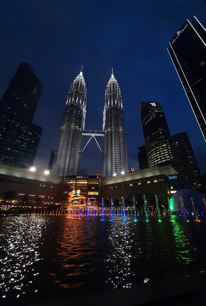 Petronas Towers illuminated with warm golden lights