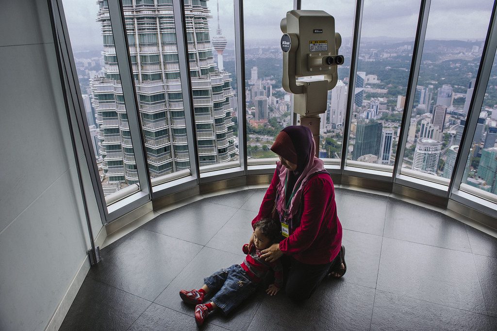 Wide panorama from the Petronas observation deck showing KL landmarks